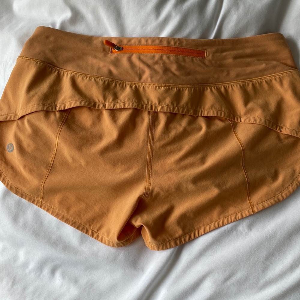 Lululemon Speed Up Low-Rise Lined Short 2.5” in orange, size 6